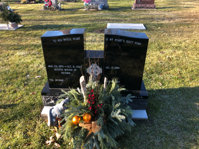 Jet black colored granite memorial monument in a cemetary